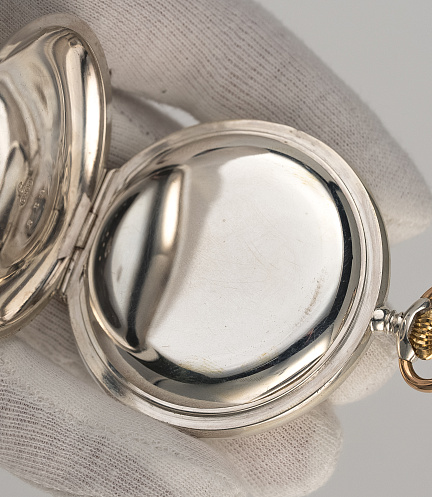 Silver Pocket Watch with a Triple Bridge Movement