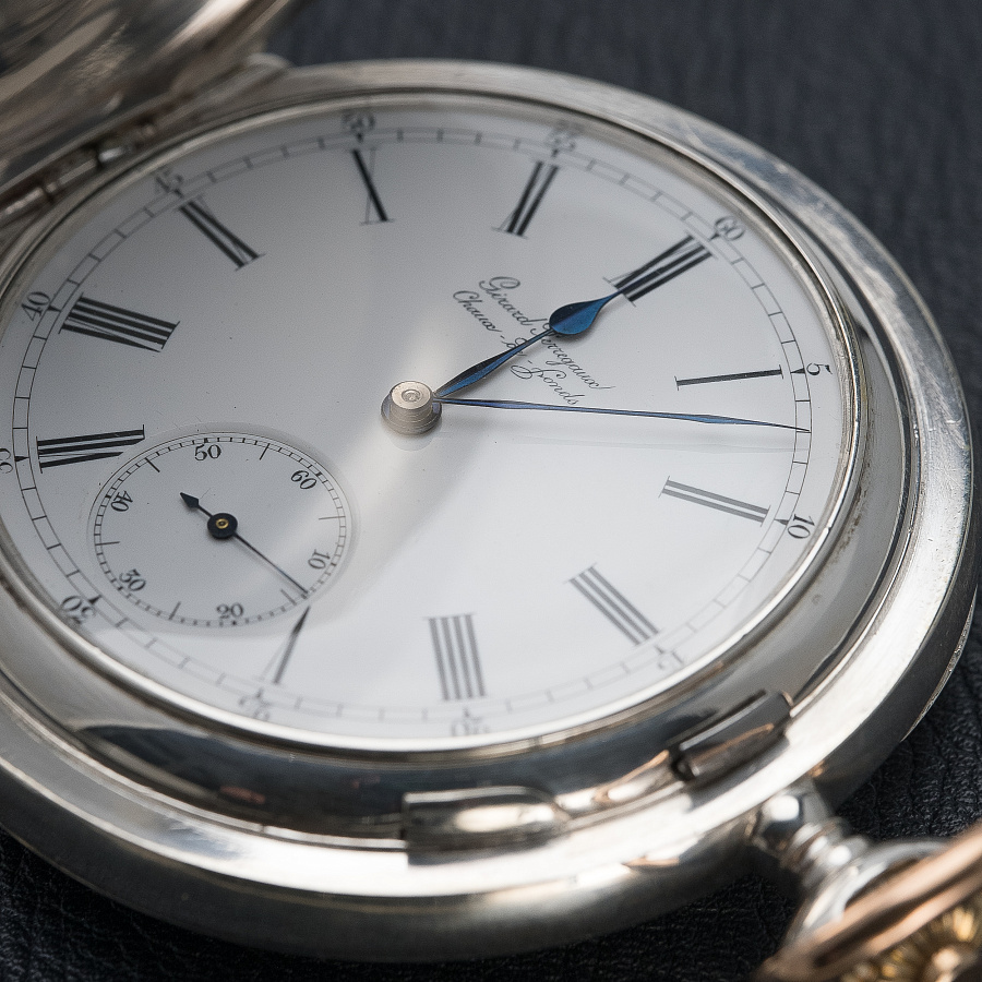 Silver Pocket Watch with a Triple Bridge Movement