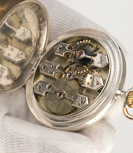 Silver Pocket Watch with a Triple Bridge Movement