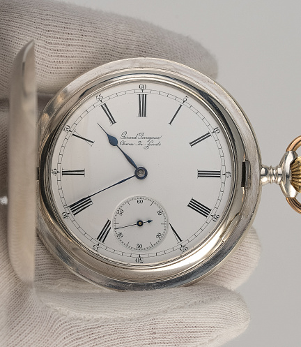 Silver Pocket Watch with a Triple Bridge Movement