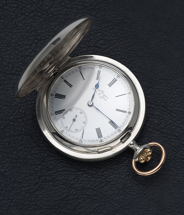 Silver Pocket Watch with a Triple Bridge Movement