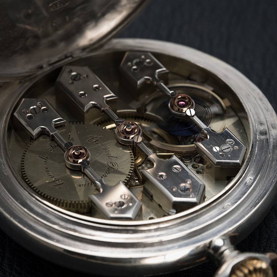 Silver Pocket Watch with a Triple Bridge Movement