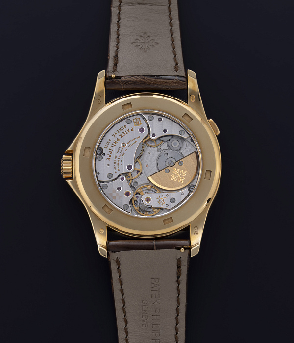World Time in Yellow Gold with Enamel Dial