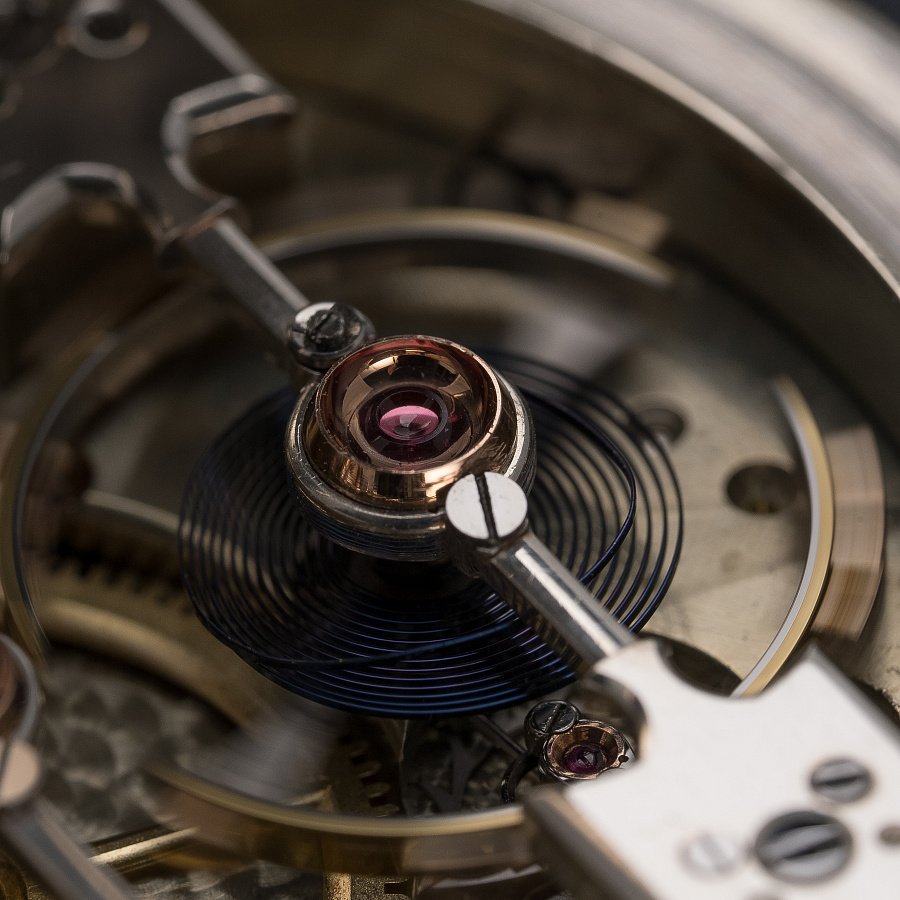 Silver Pocket Watch with a Triple Bridge Movement
