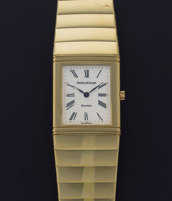 Reverso with integrated bracelet in Yellow Gold